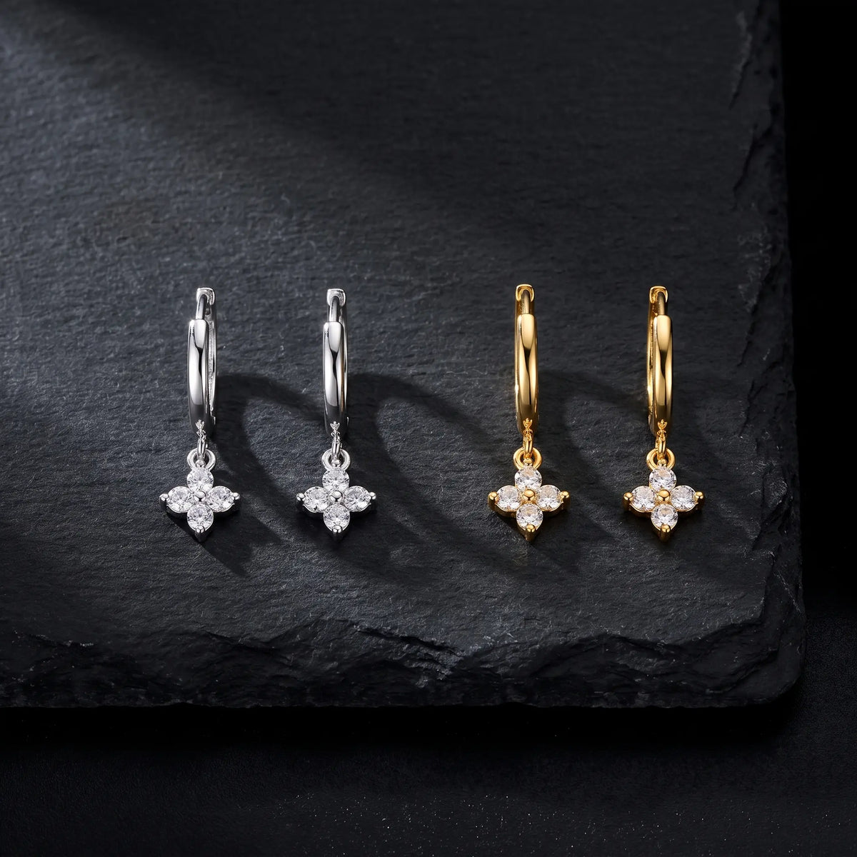 Leaf earrings shown in silver and gold