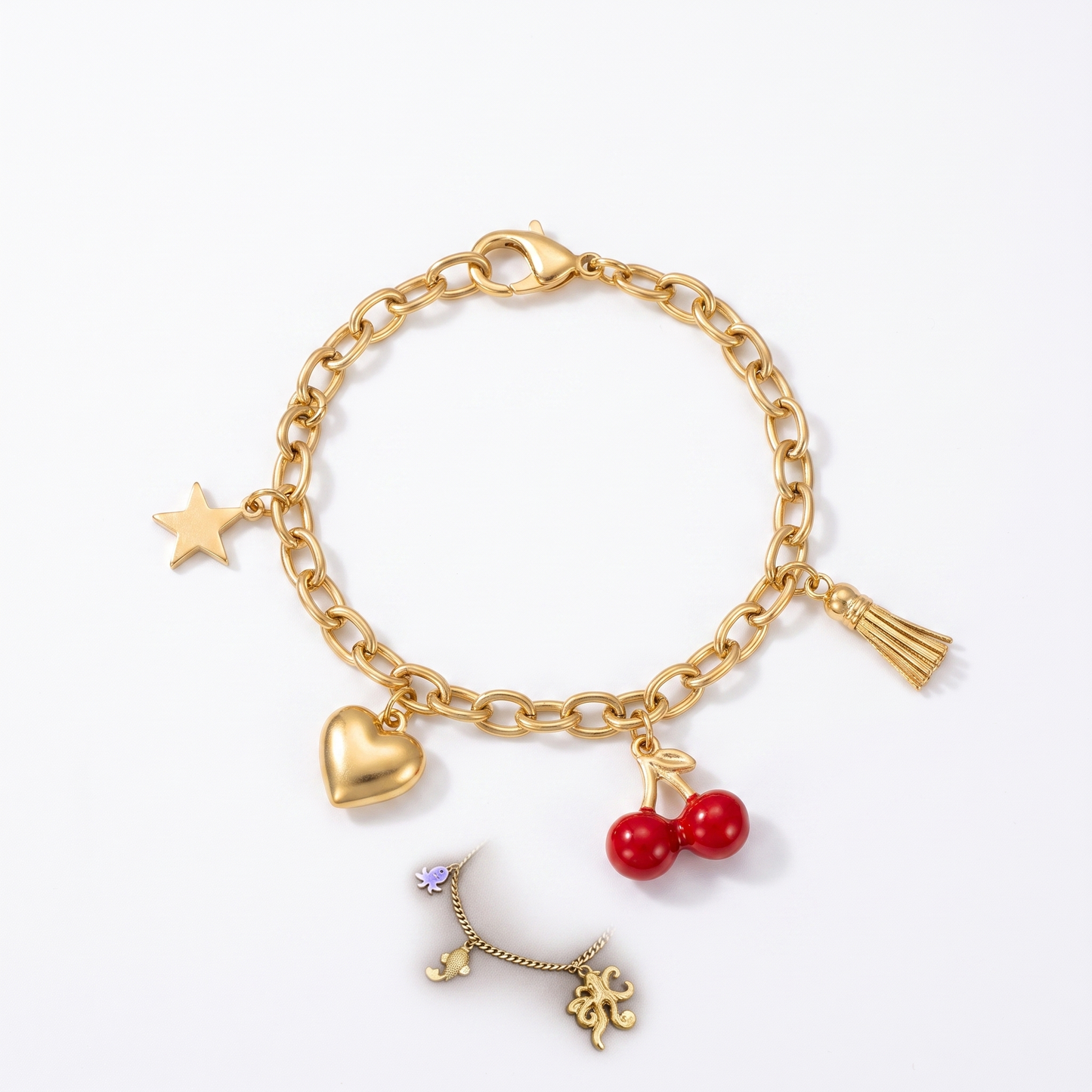 Star heart cherry tassel bracelet shown laid flat