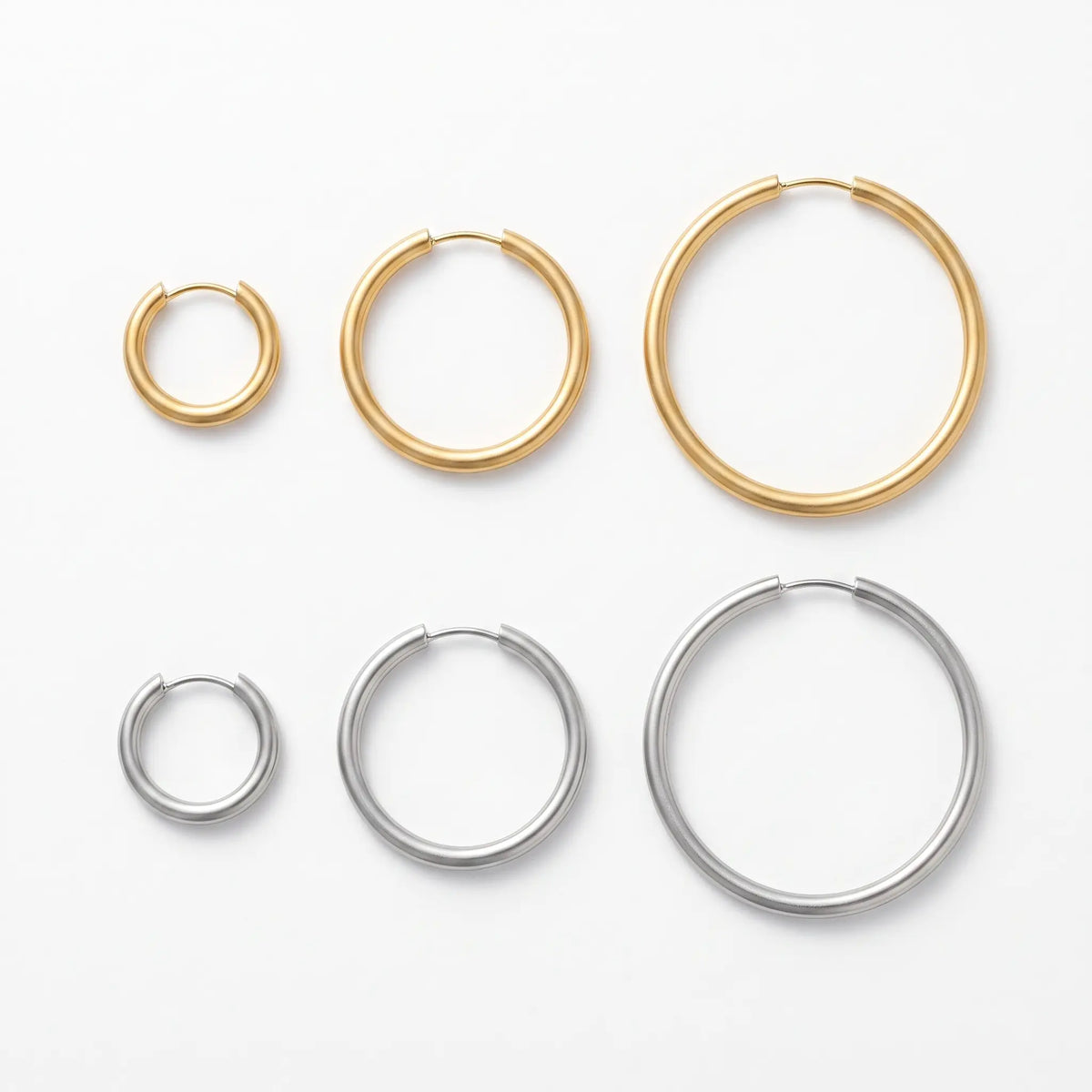 Circle hoops shown in six sizes, gold and silver