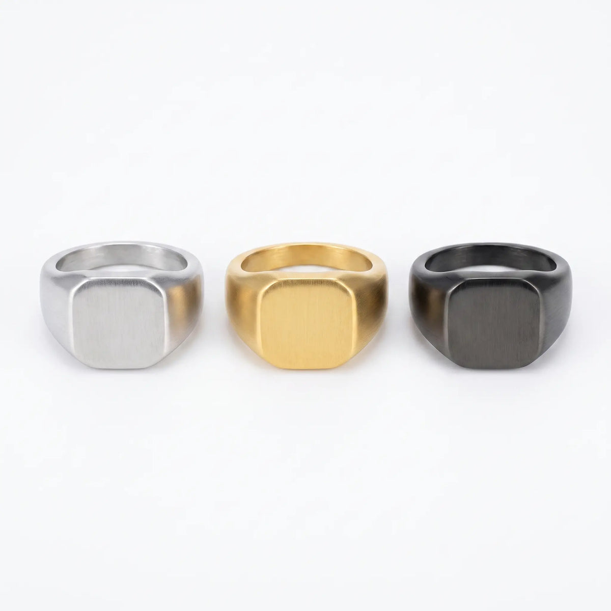 Square signet ring shown in silver, gold, gunmetal