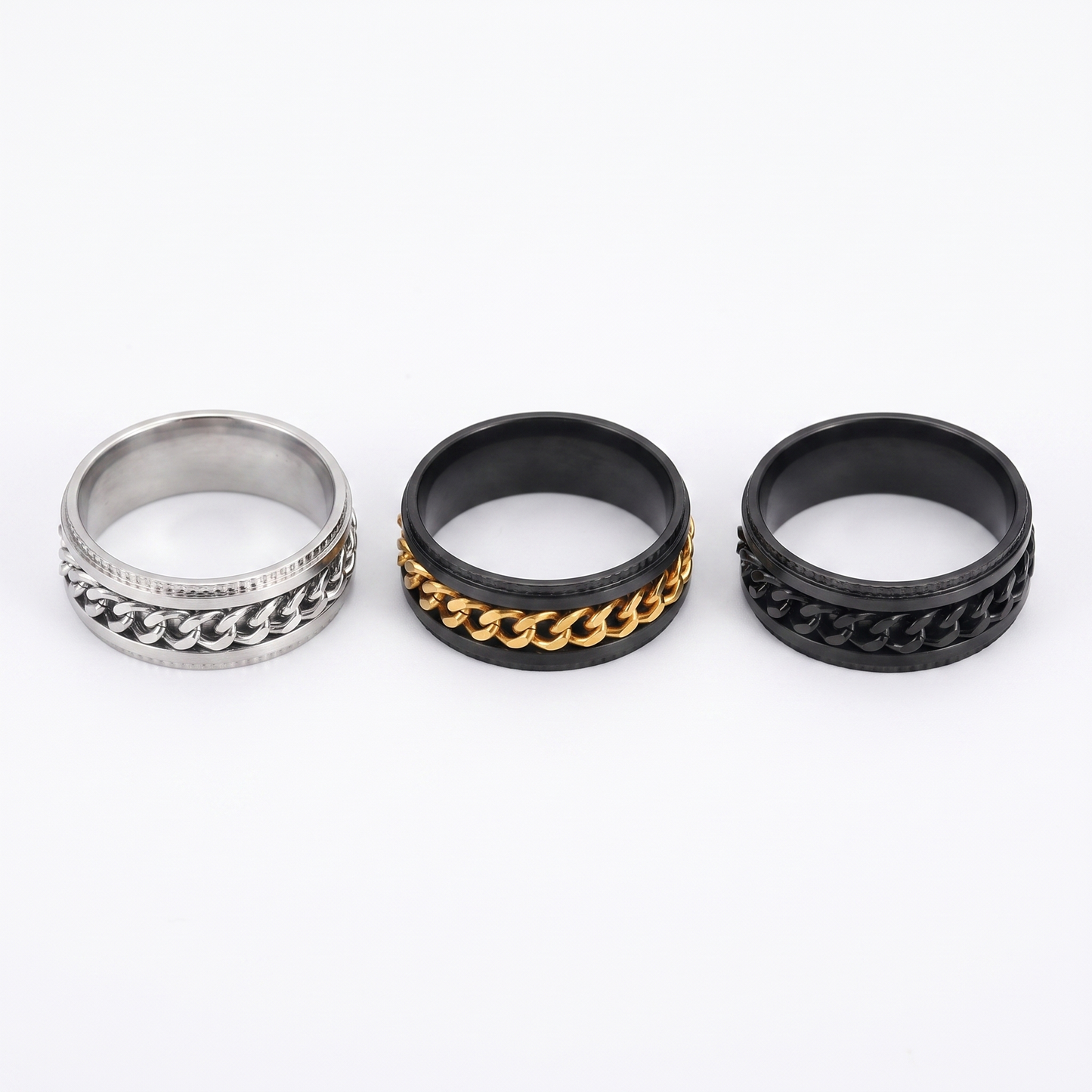Spinner ring shown in silver, gold, black