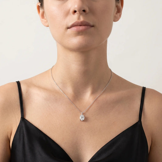 Moissanite solitaire pendant worn, front view