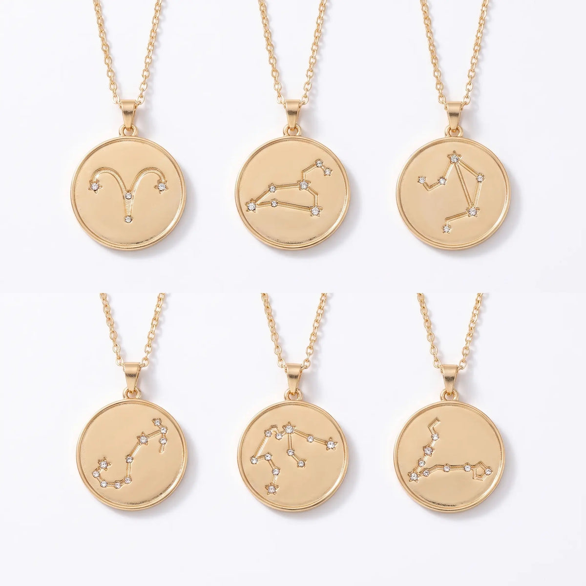 Zodiac necklaces shown in six signs