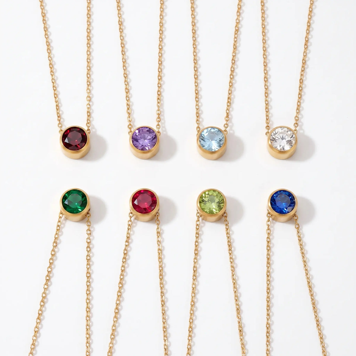 Birthstone necklace shown in eight stone colors