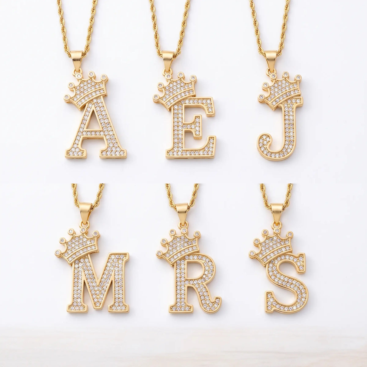 Crown alphabet pendant shown in six letters