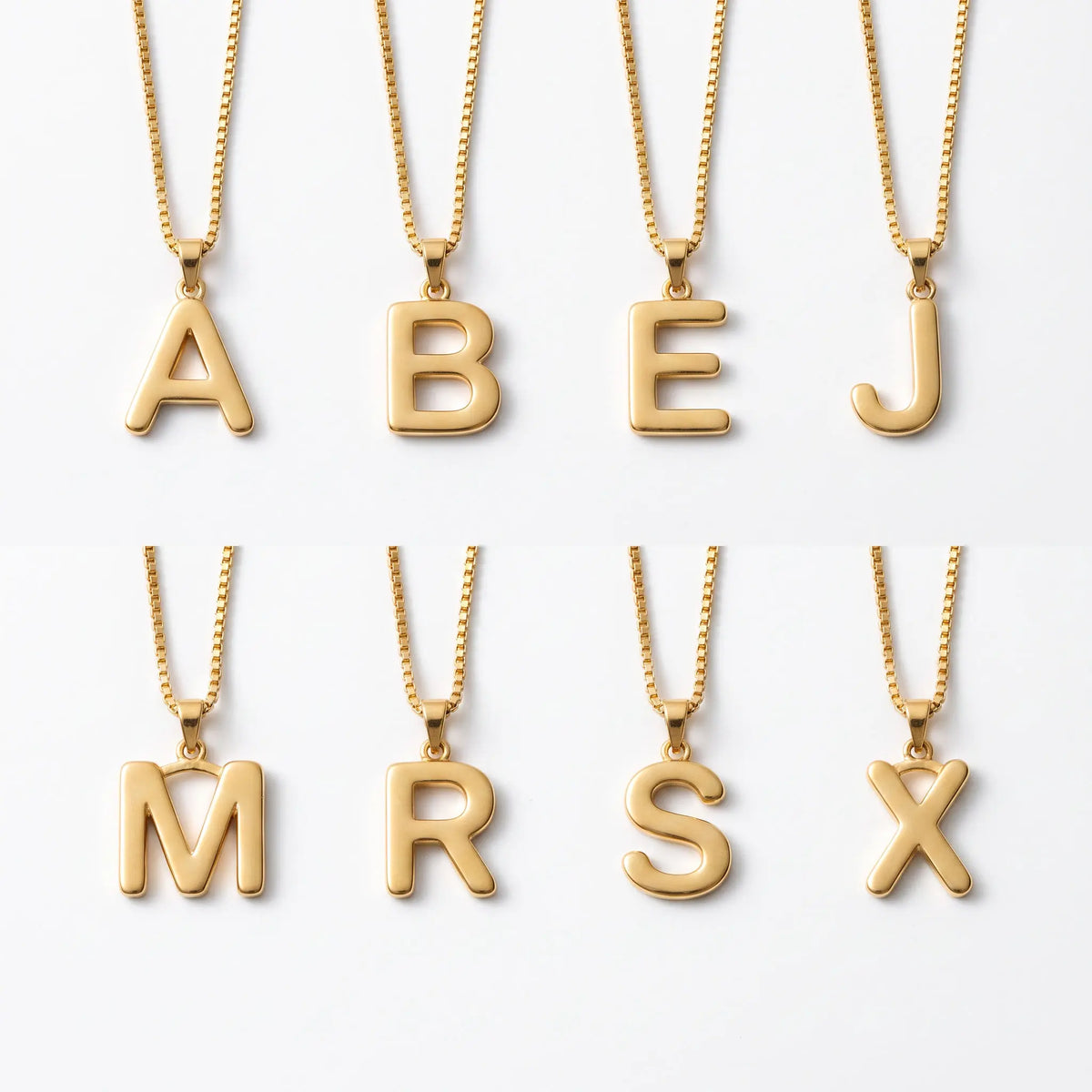 Initial necklace shown in eight letters