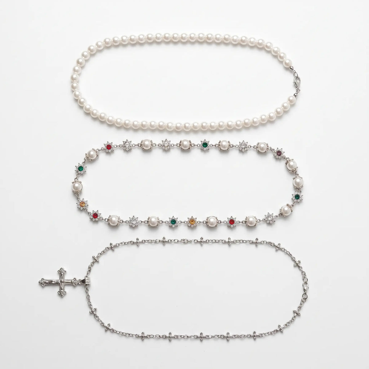 Cross set shown as all three necklaces