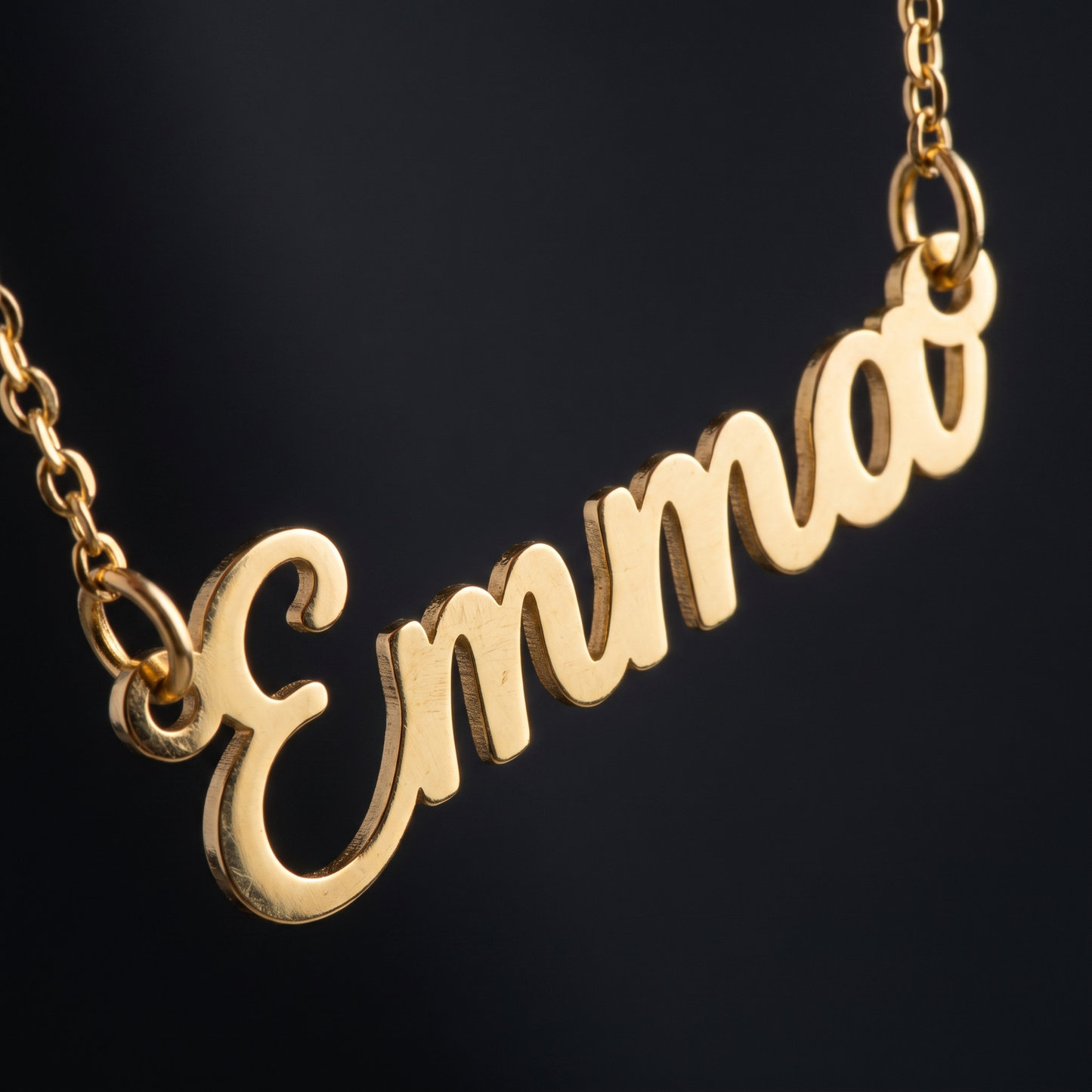 Close-up of the laser-cut cursive nameplate