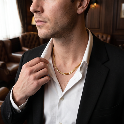 Gold curb chain necklace worn, front view