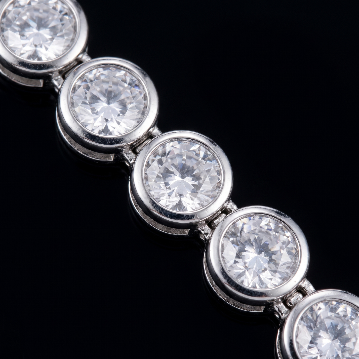 Close-up of bezel-set CZ stones