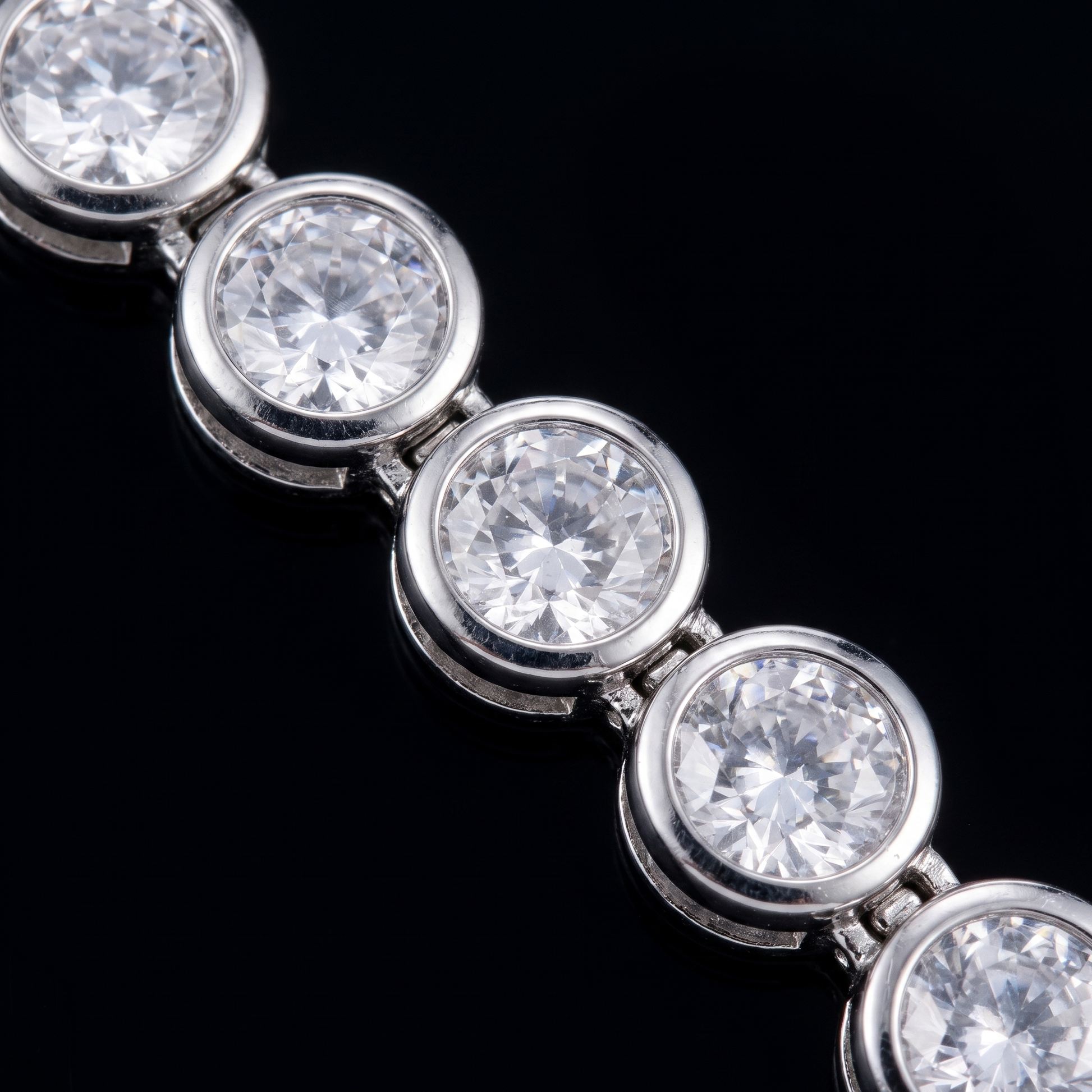Close-up of bezel-set CZ stones