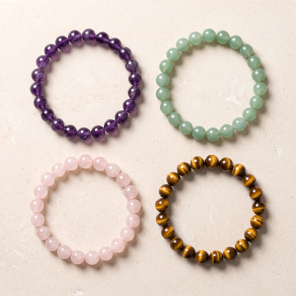Amethyst bead bracelet shown in amethyst, aventurine, rose quartz, tiger's eye
