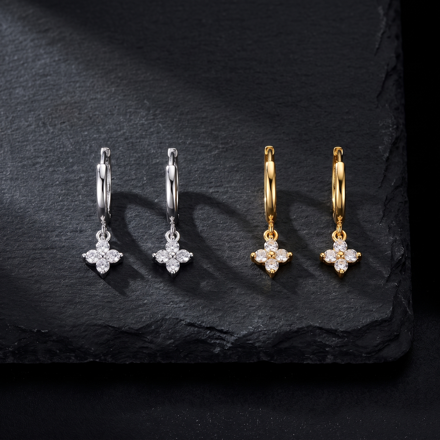 Leaf earrings shown in silver and gold