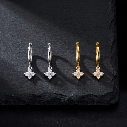 Leaf earrings shown in silver and gold