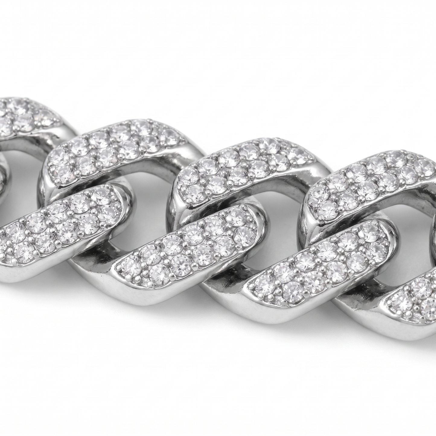 Macro detail of prong-set stones and link edges on the Iced Out Cuban chain