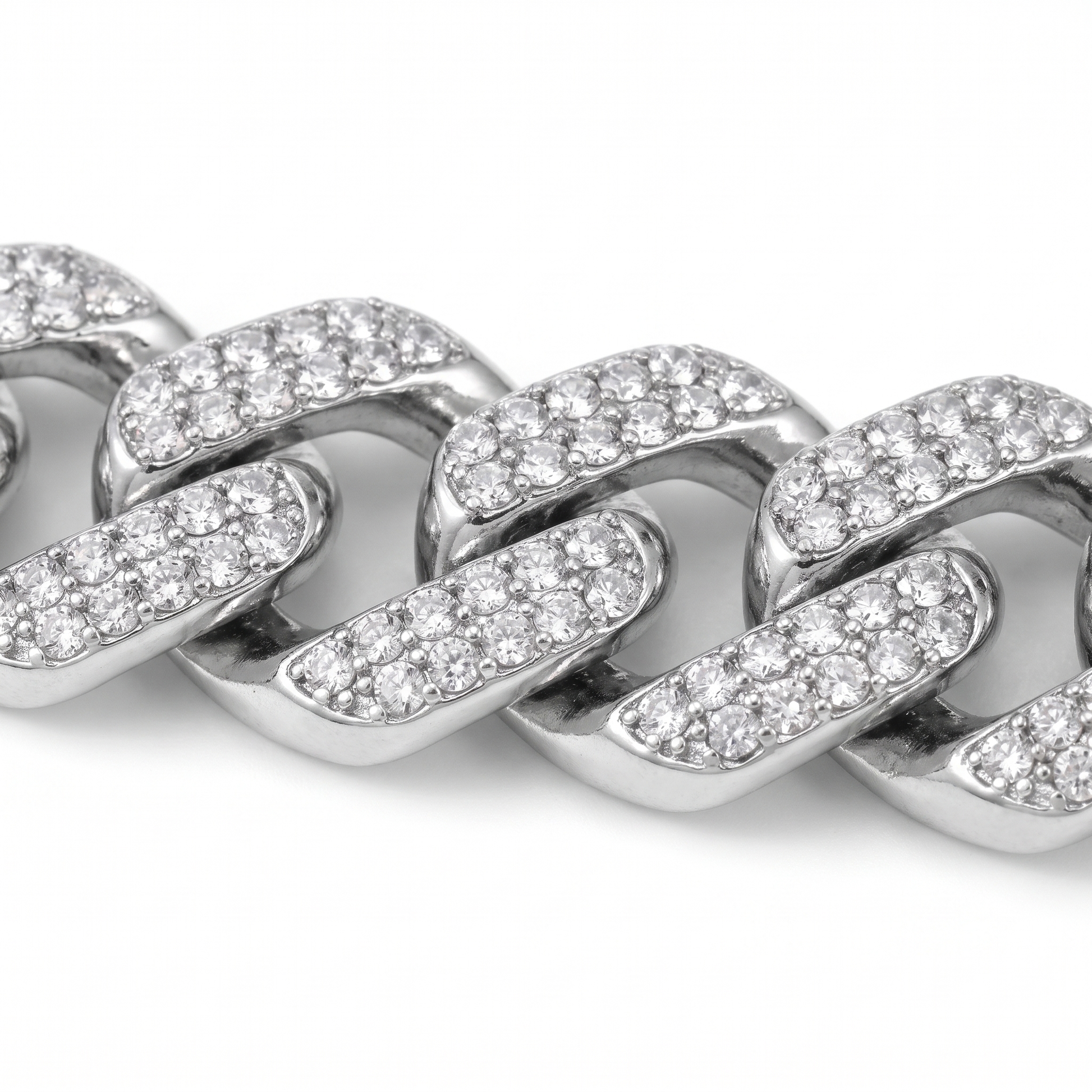 Macro detail of prong-set stones and link edges on the Iced Out Cuban chain