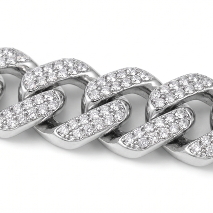 Macro detail of prong-set stones and link edges on the Iced Out Cuban chain