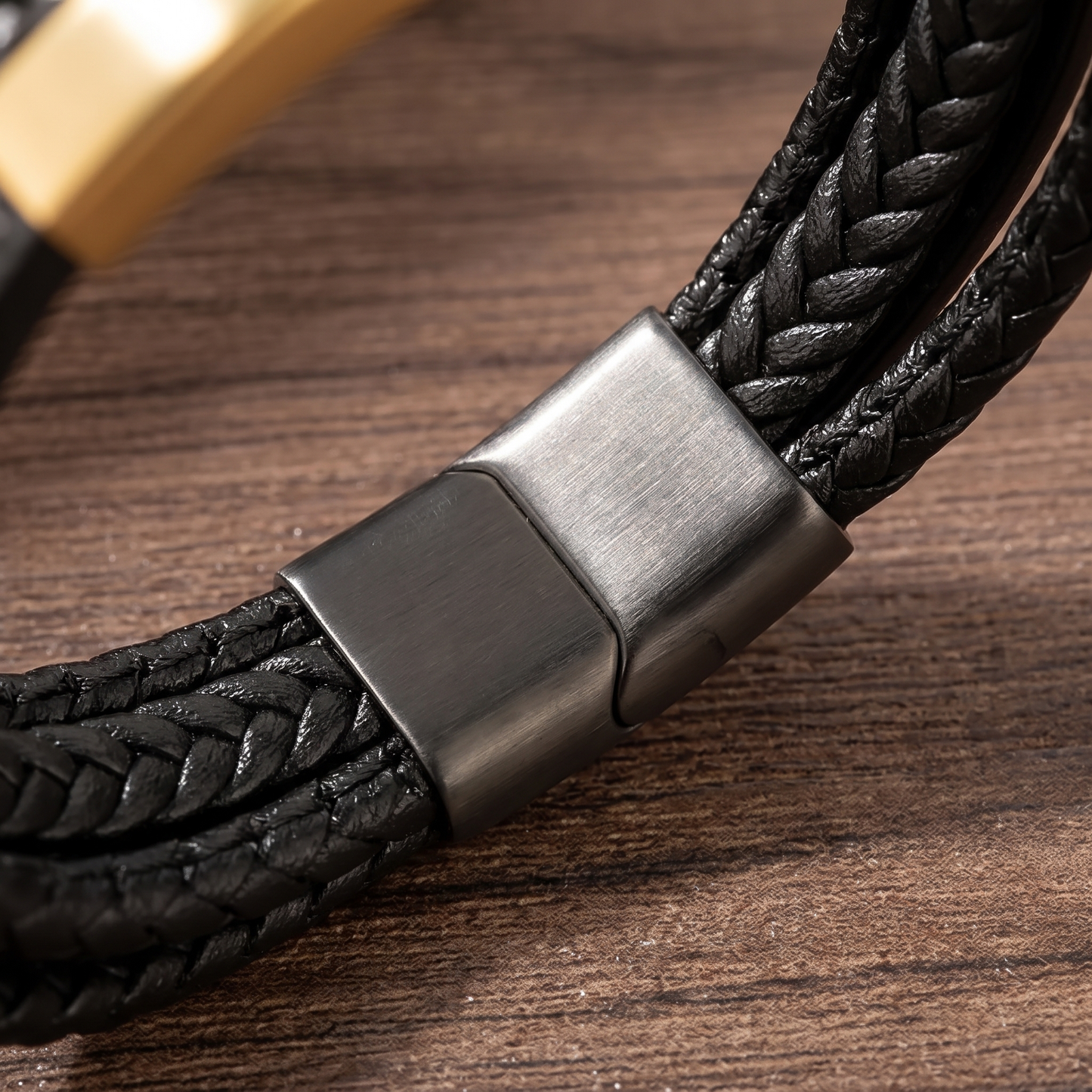 Close-up of the braid and gunmetal magnetic clasp