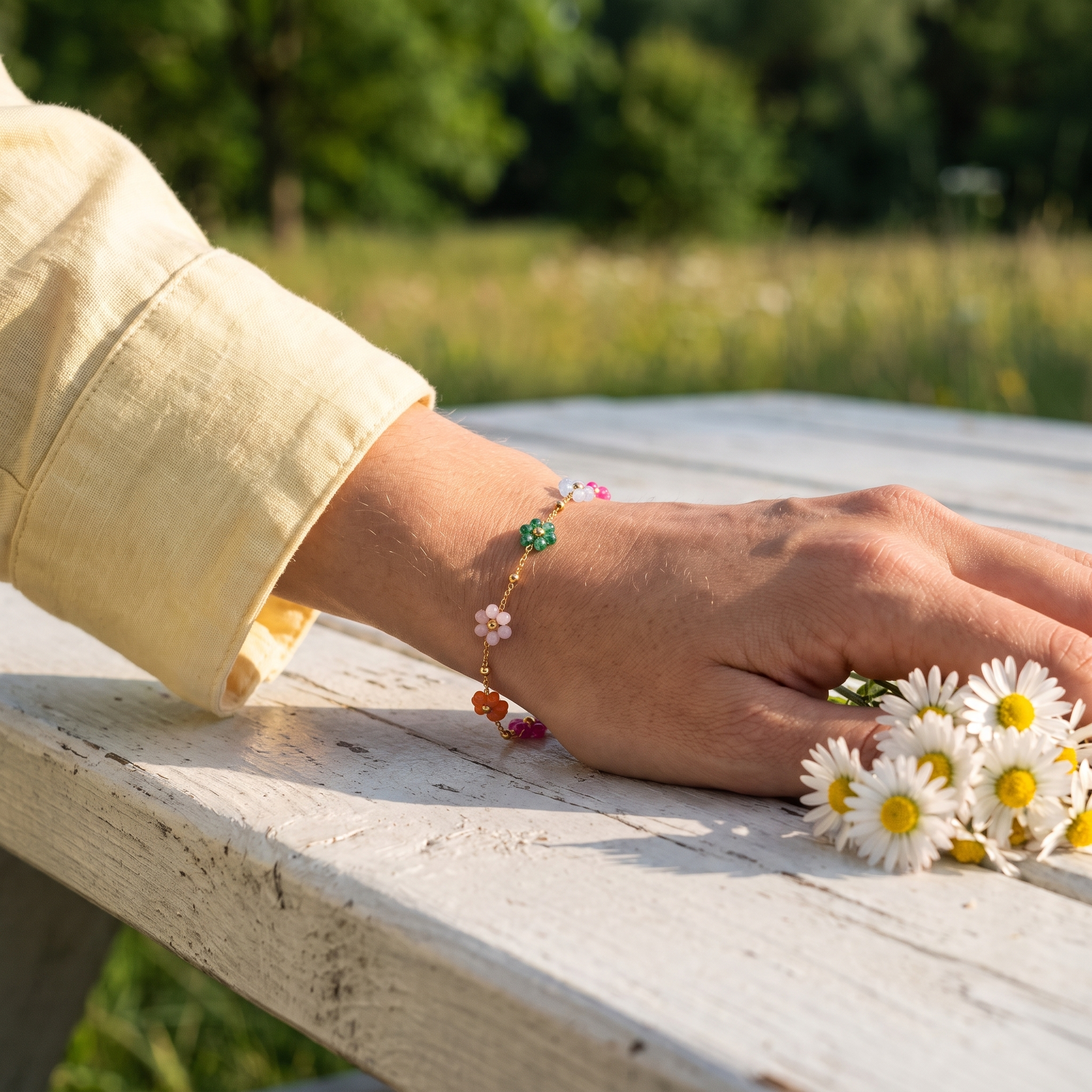 Enamel flower bracelet worn, second angle