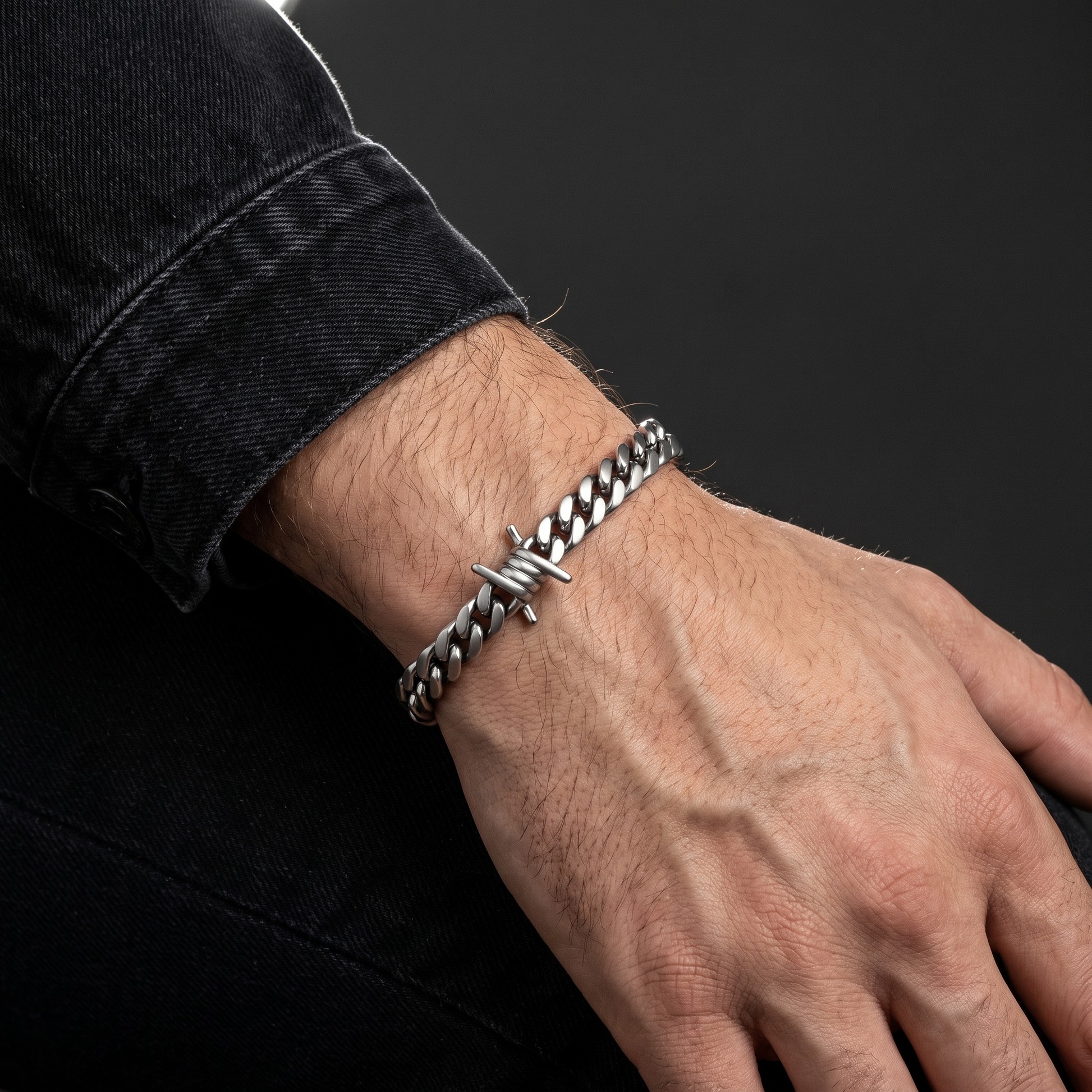 Barbed wire Cuban bracelet worn, front view