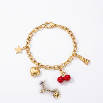 Star heart cherry tassel bracelet shown laid flat