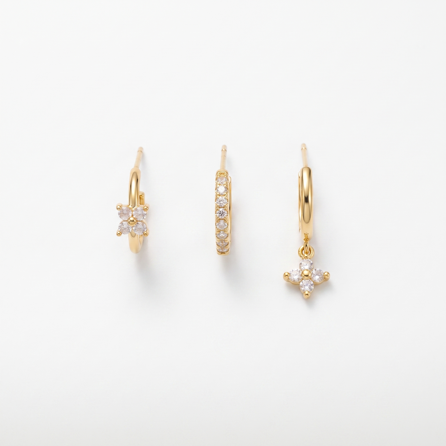 Flower drop earrings shown as three-piece set
