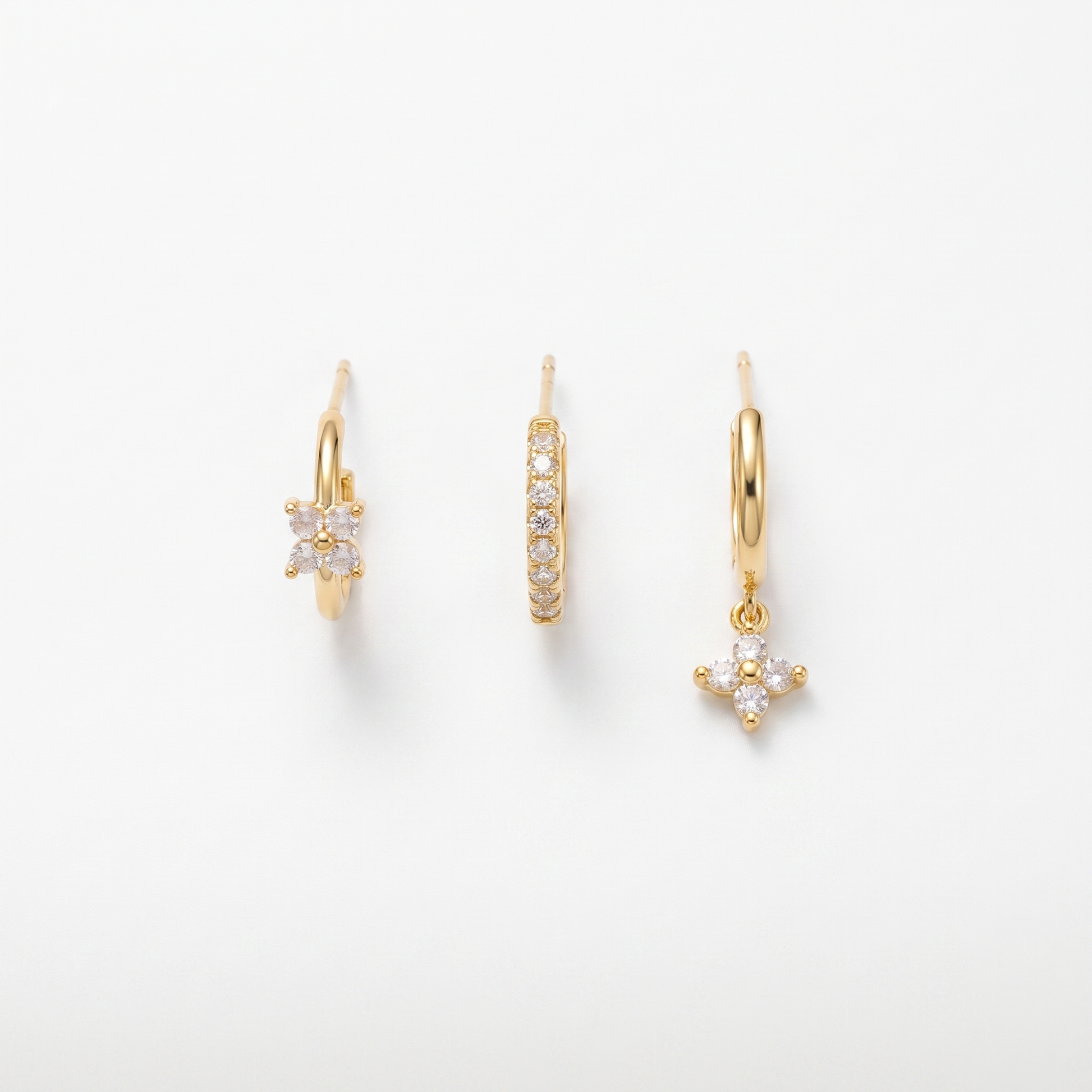 Flower drop earrings shown as three-piece set