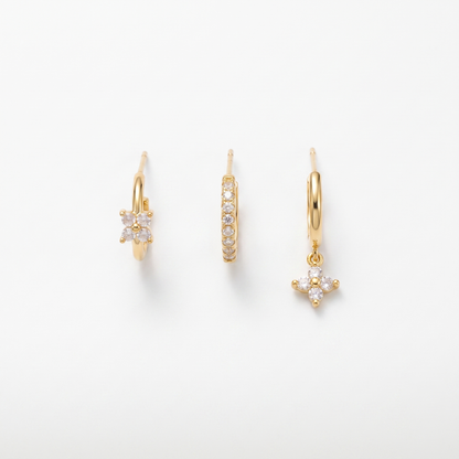 Flower drop earrings shown as three-piece set