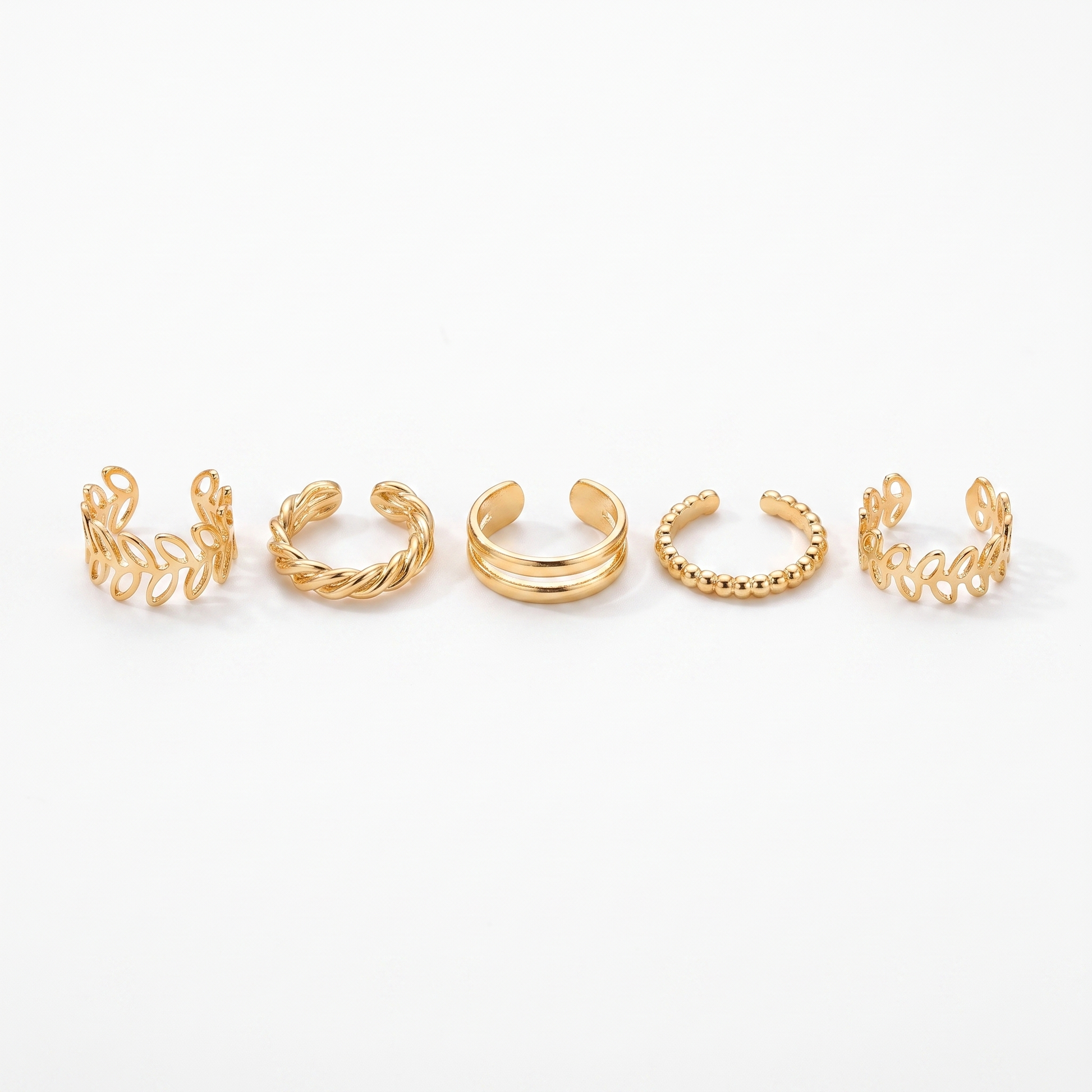 Ear cuff set shown as all five designs