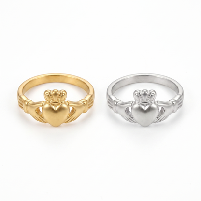 Claddagh ring shown in gold and silver