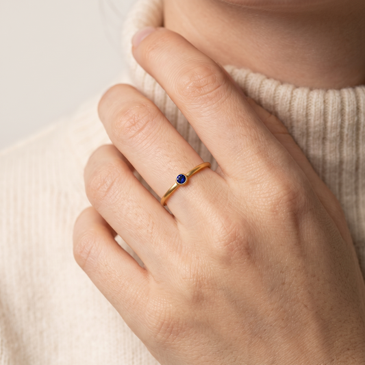 Birthstone ring worn, second angle