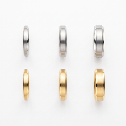 Tungsten bands shown in three widths, silver and gold