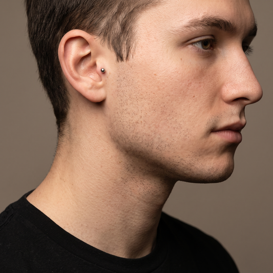 Labret stud worn as a tragus piercing