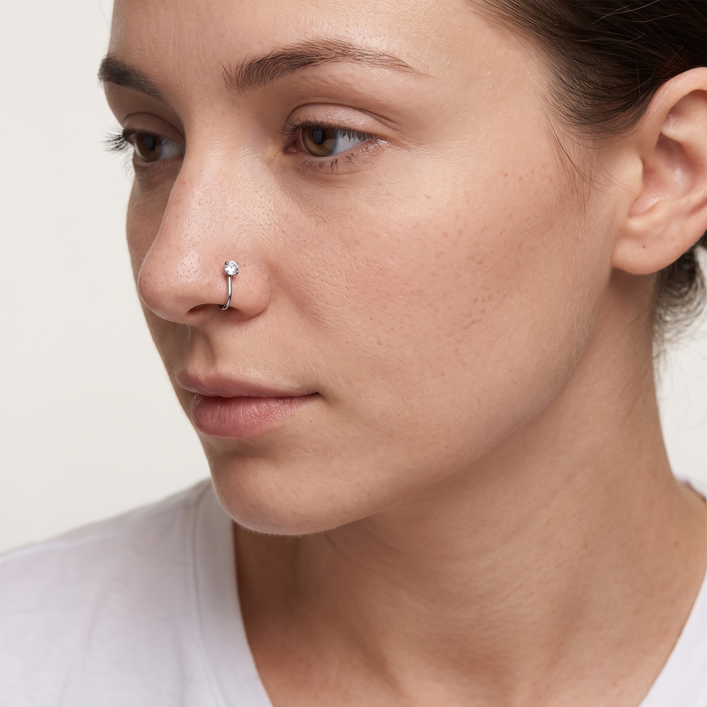 CZ nose stud worn in the nostril