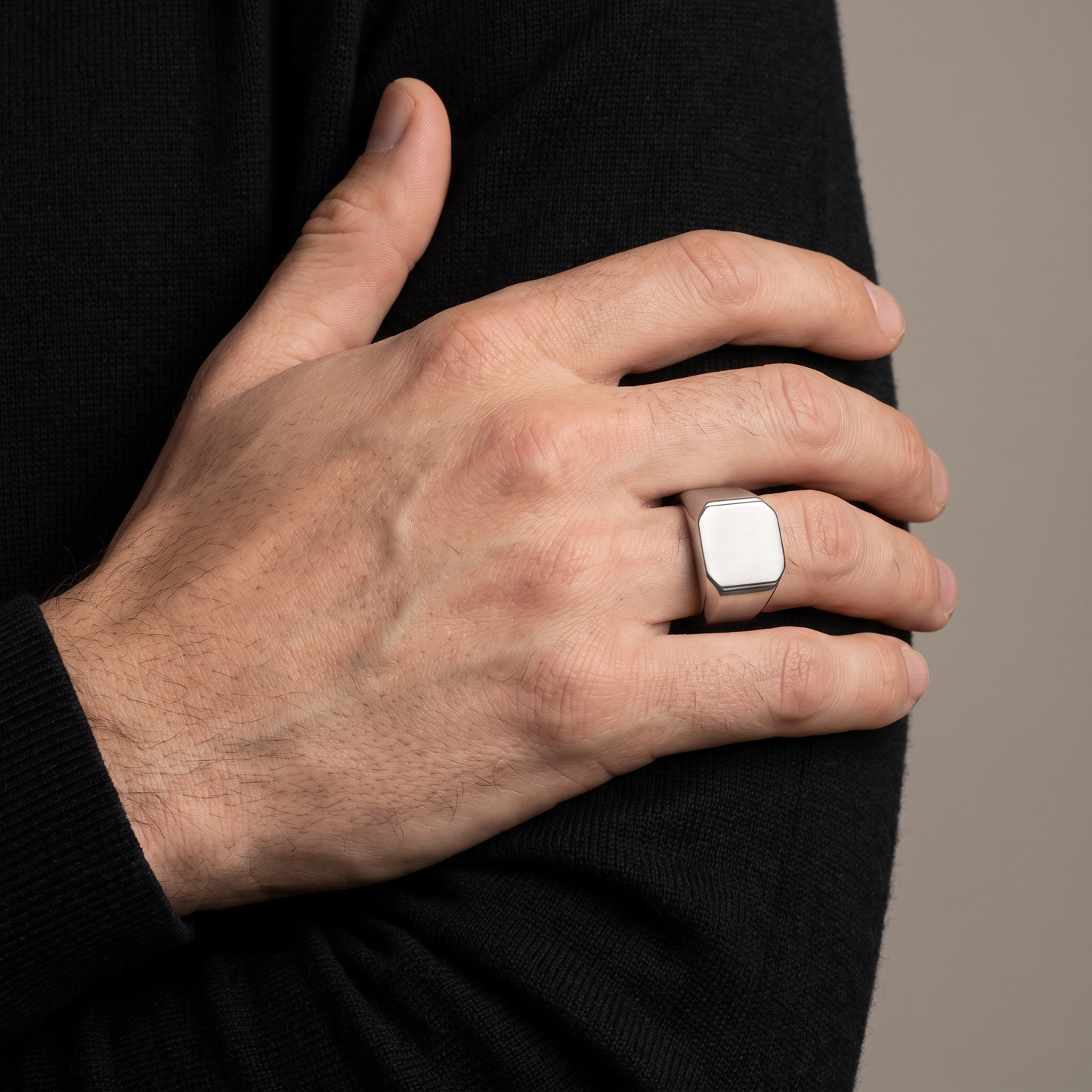 Brushed square signet ring worn, front view