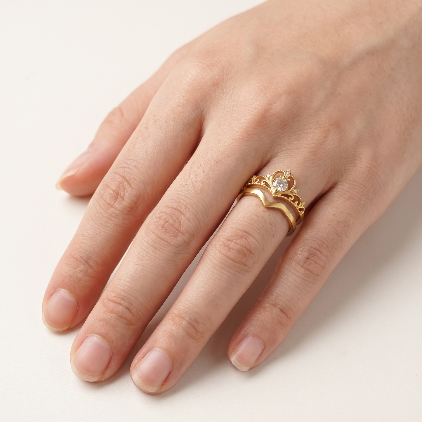 Crystal crown ring set worn, front view