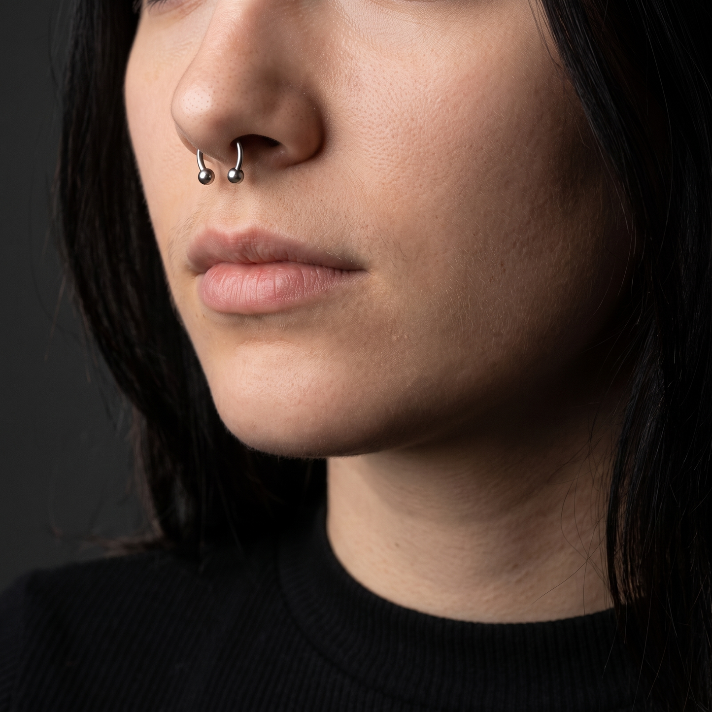 Faux horseshoe septum ring worn, front view