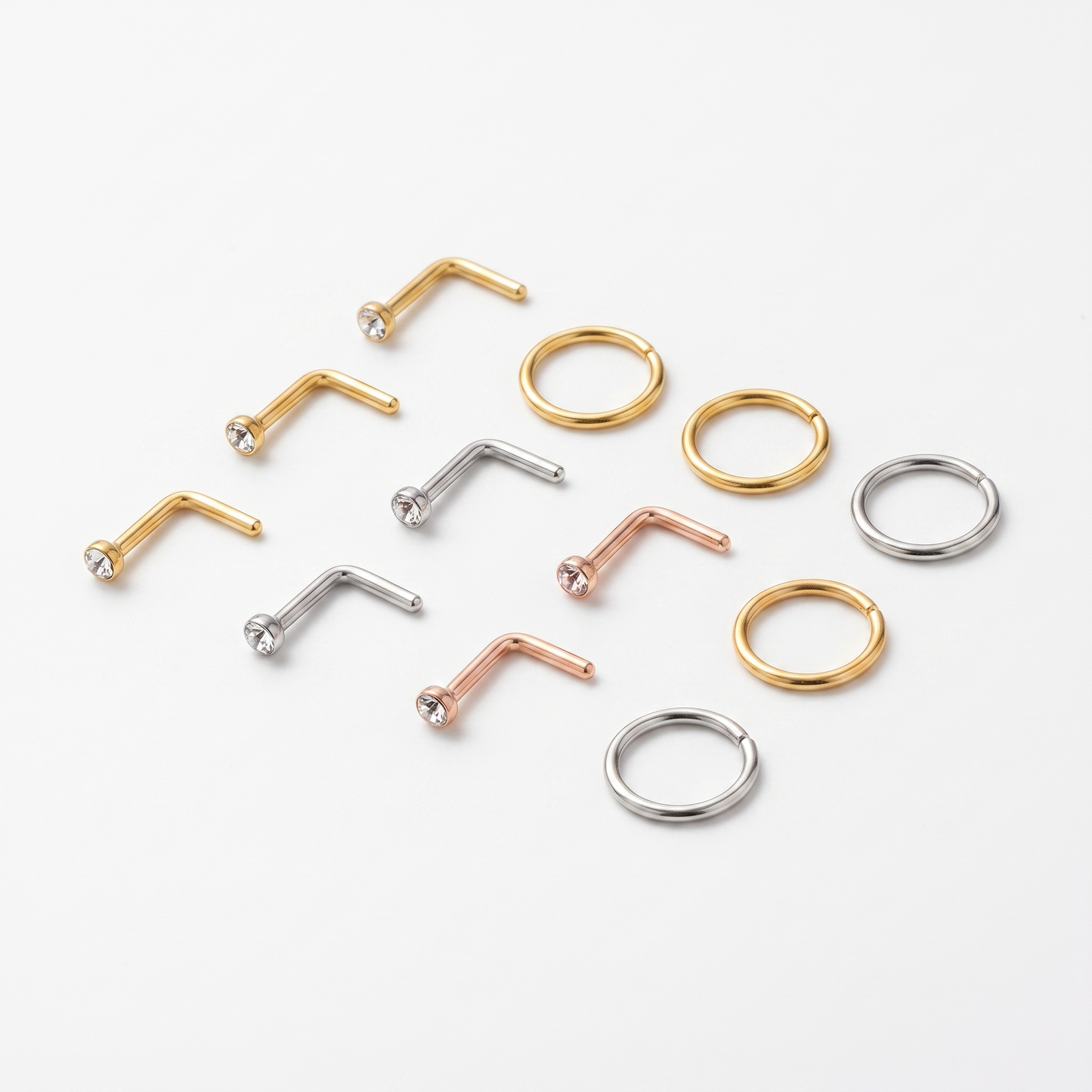 Assorted nose studs and hoops product shot
