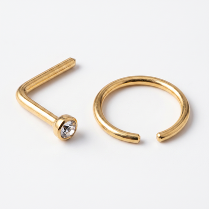 Close-up of an L-shaped stud and a nose hoop