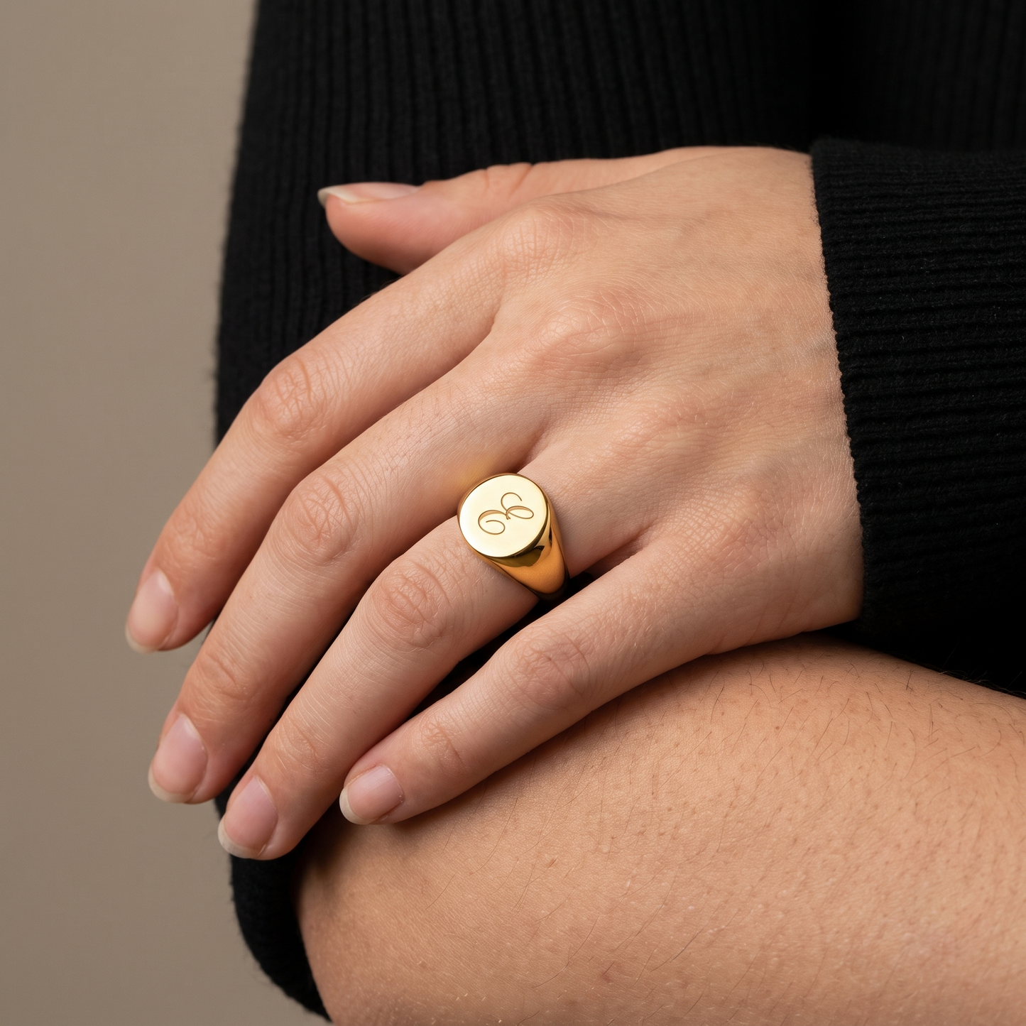 Customized signet ring worn, front view