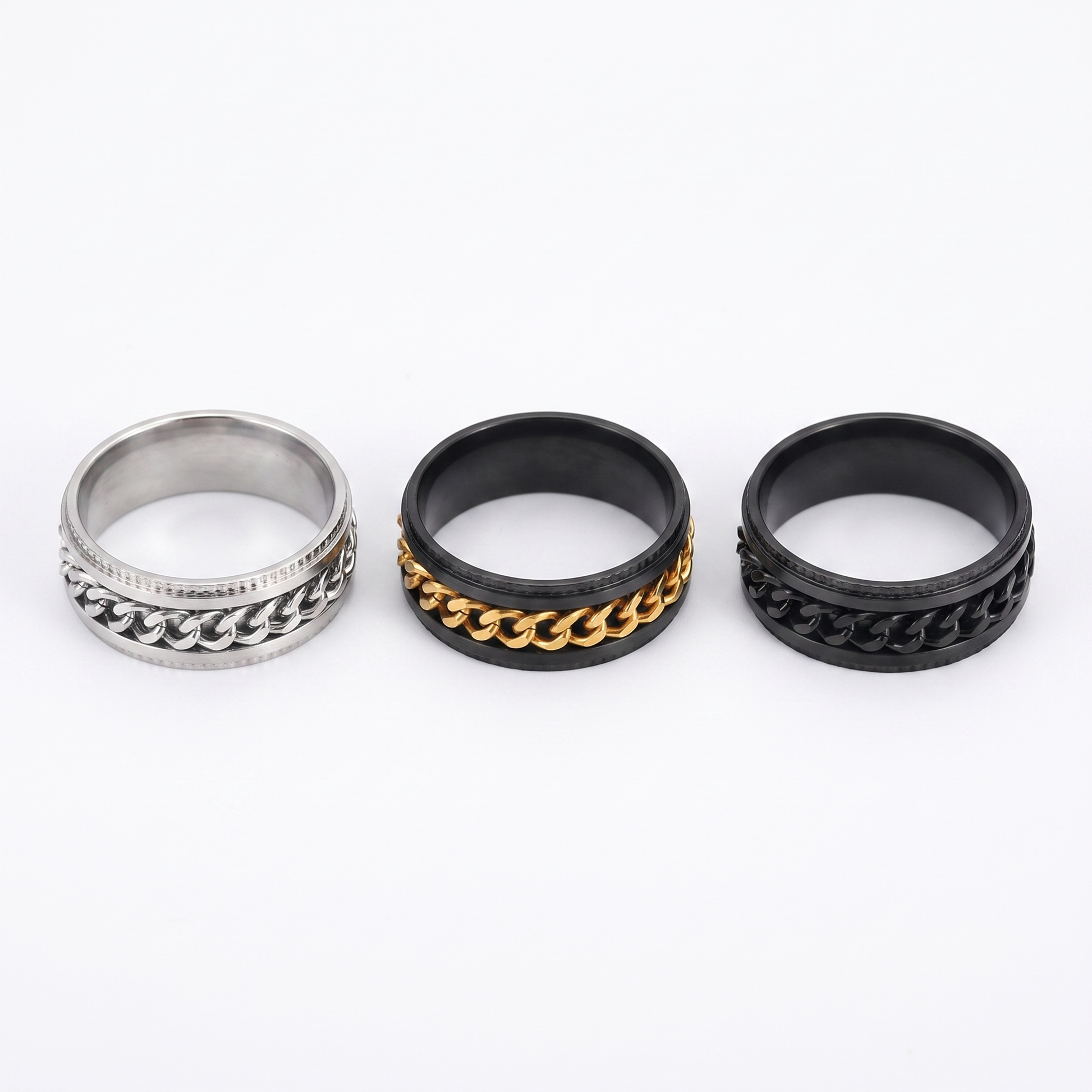 Spinner ring shown in silver, gold, black