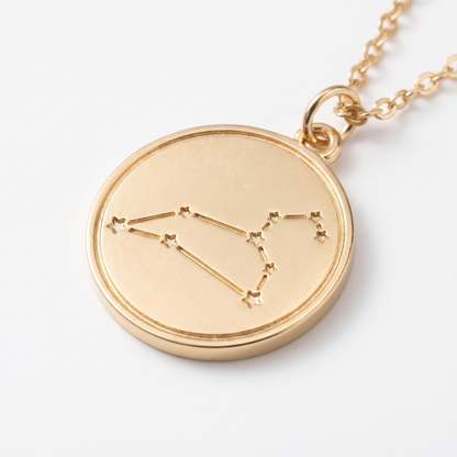 Close-up of constellation disc pendant