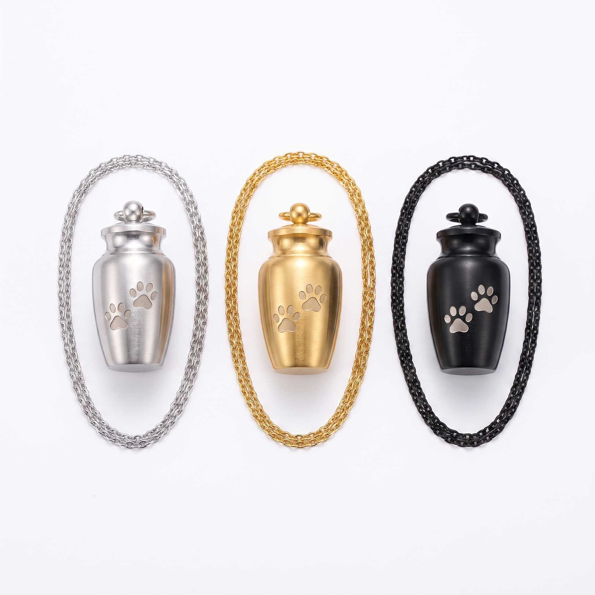 Urn pendant shown in silver, gold, black