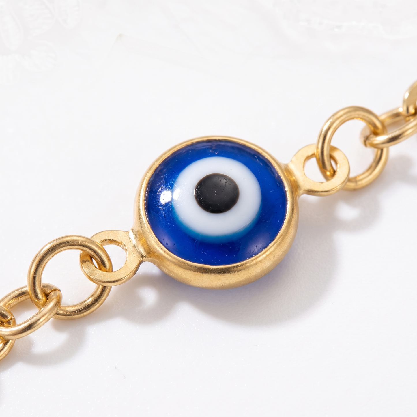 Close-up of evil eye charm