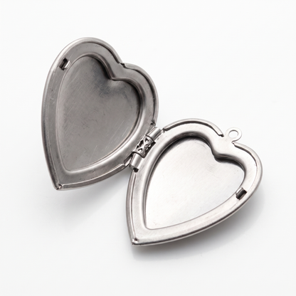 Close-up of locket open with photo frames