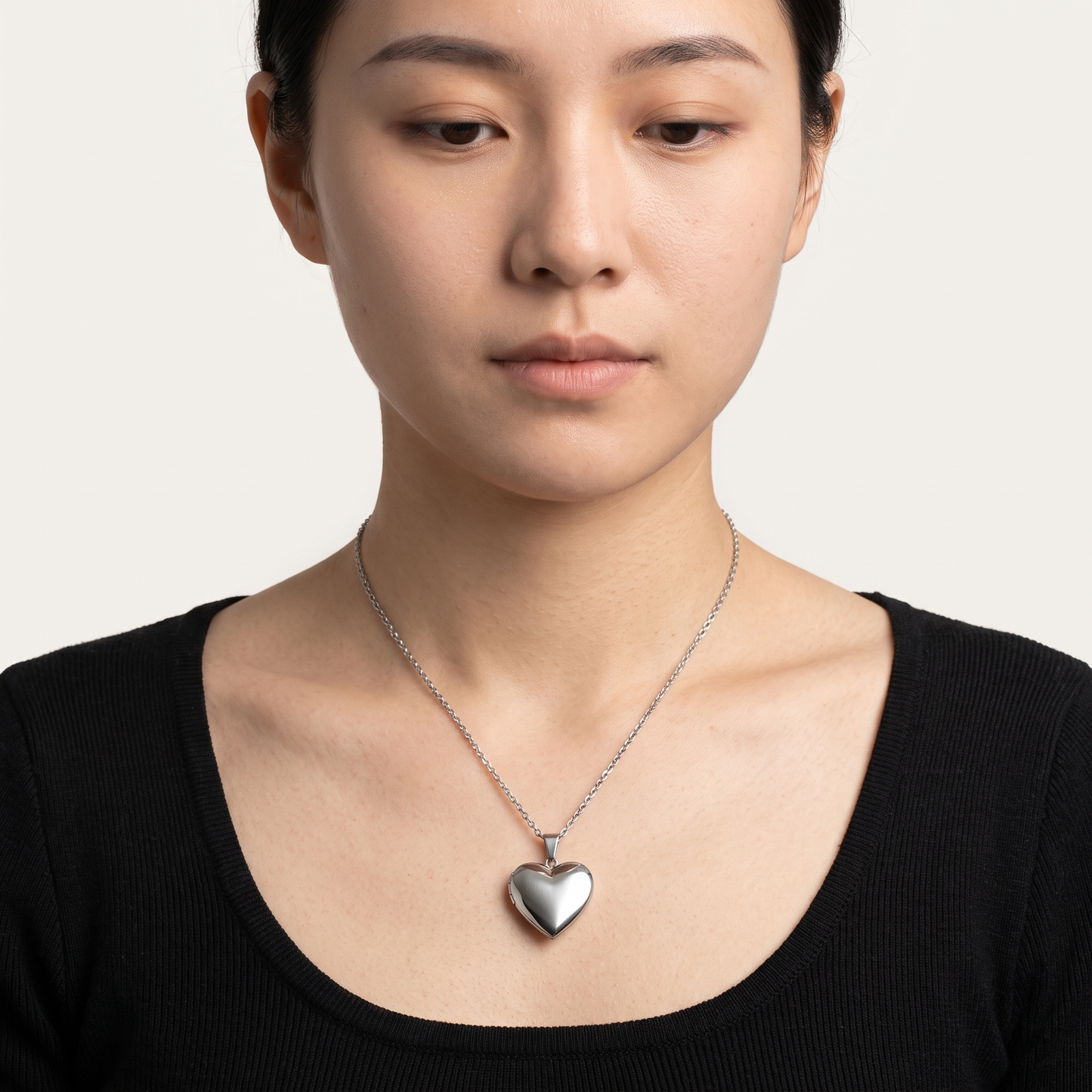 Vnox heart locket worn, front view