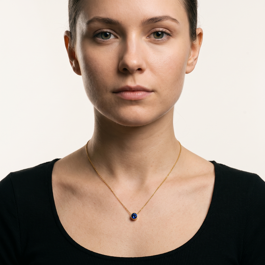 Birthstone pendant necklace worn, front view