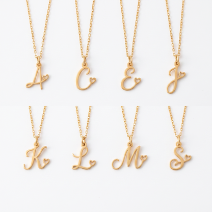 Heart initial necklace shown in eight letters