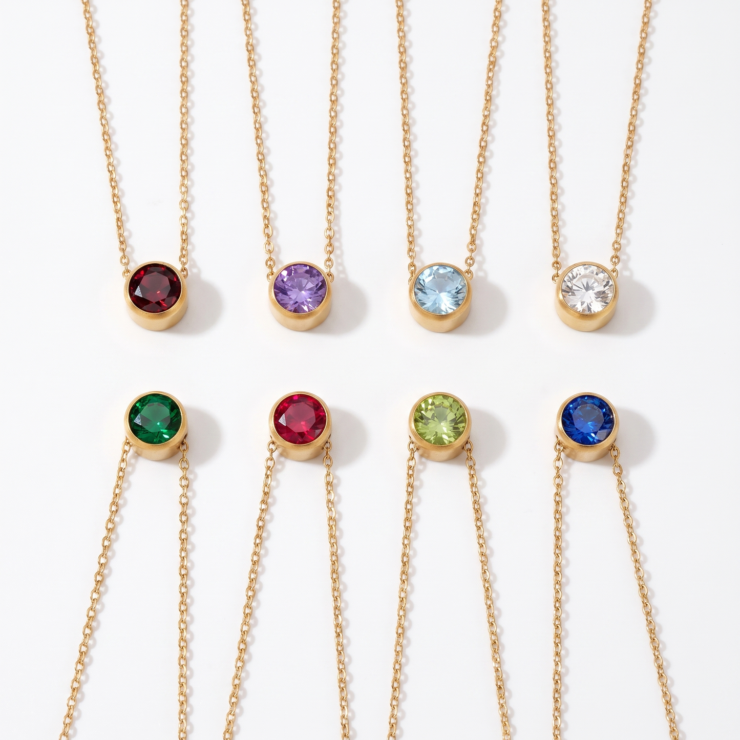 Birthstone necklace shown in eight stone colors