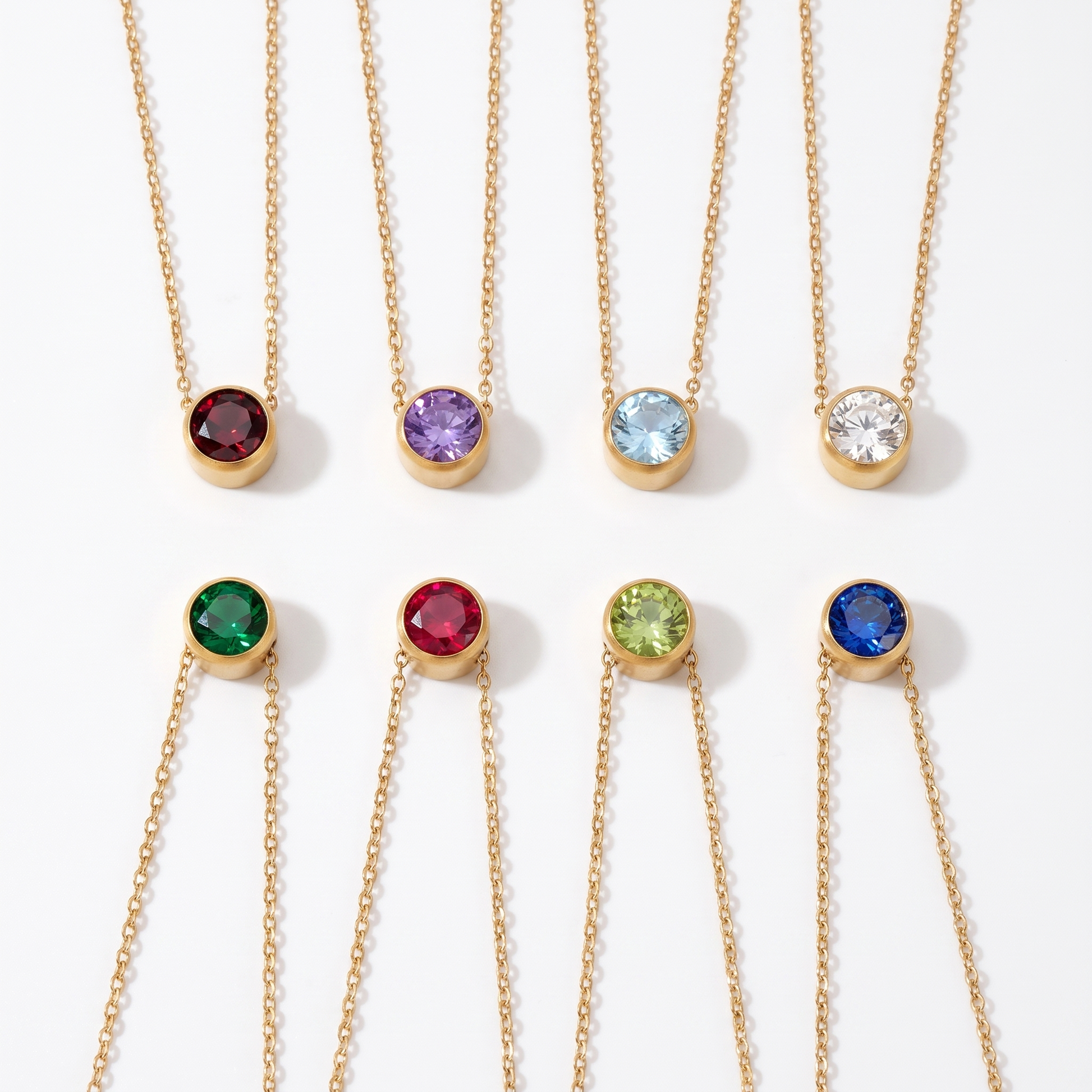 Birthstone necklace shown in eight stone colors